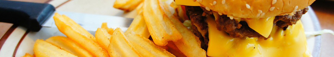 Eating Burger Sandwich Seafood Cafe at Oskar's Cafe restaurant in Dadeville, AL.